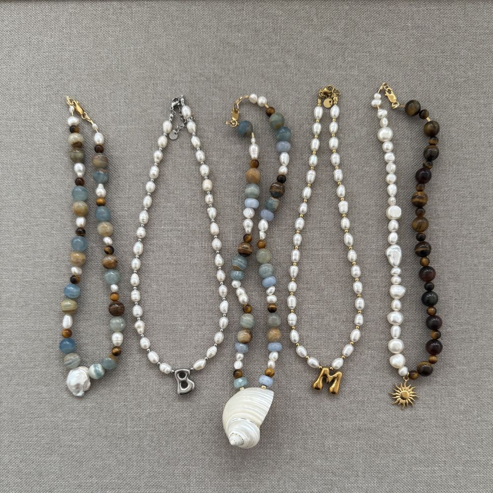 Mixed blue beaded shell pendant necklace
